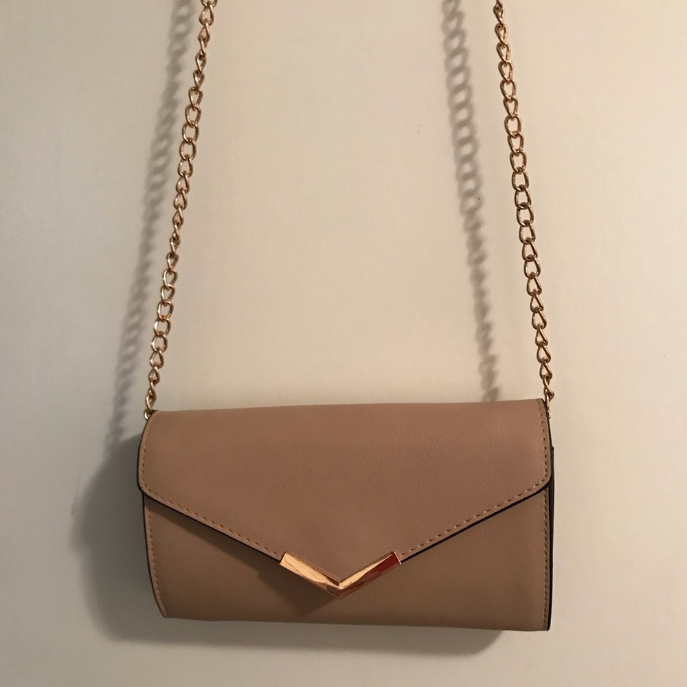 Tan envelope style crossbody purse